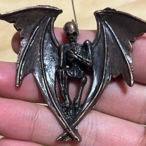 Copper winged Skelton earrings